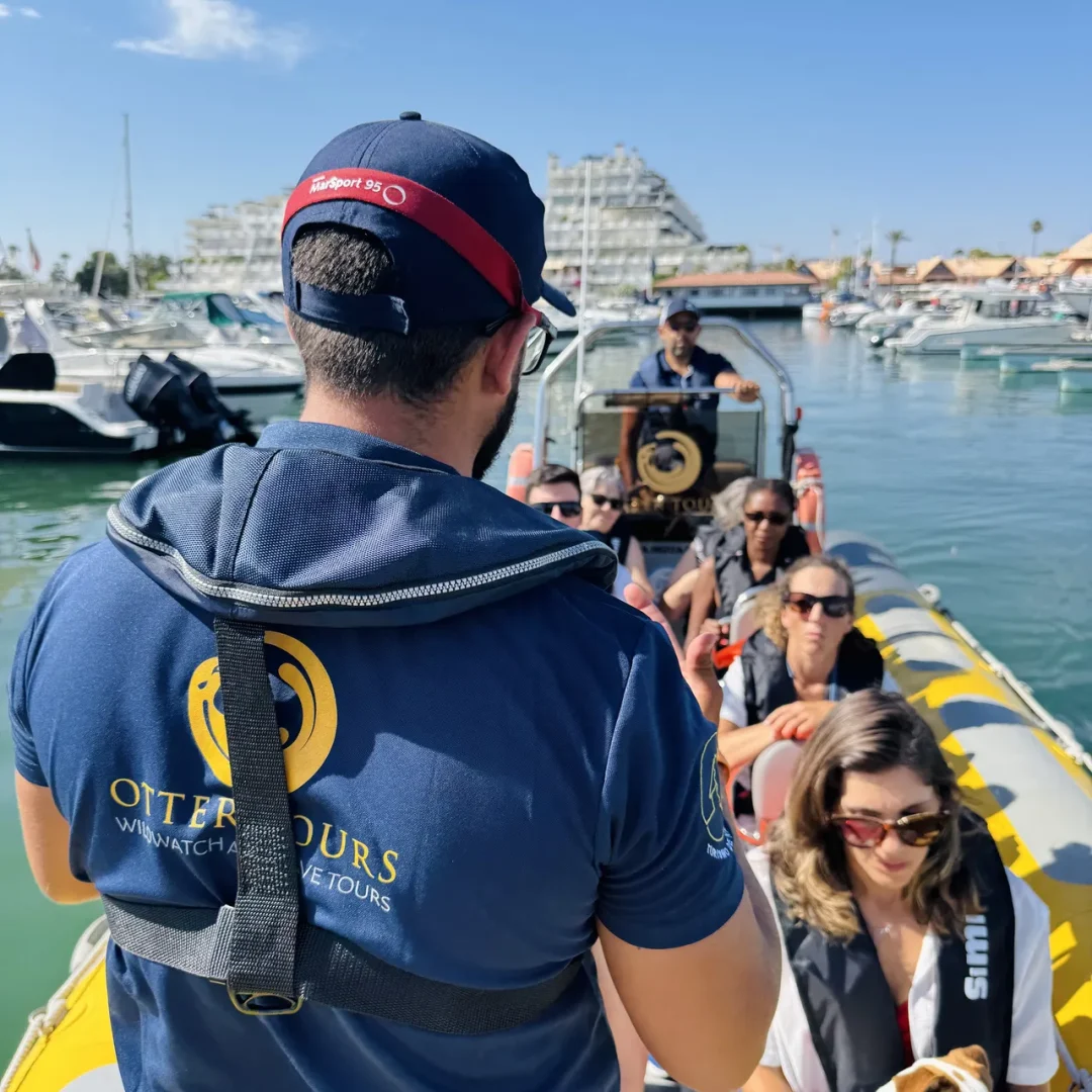 Otter Tours guide giving safety briefing to passengers before boat departure from Vilamoura Marina