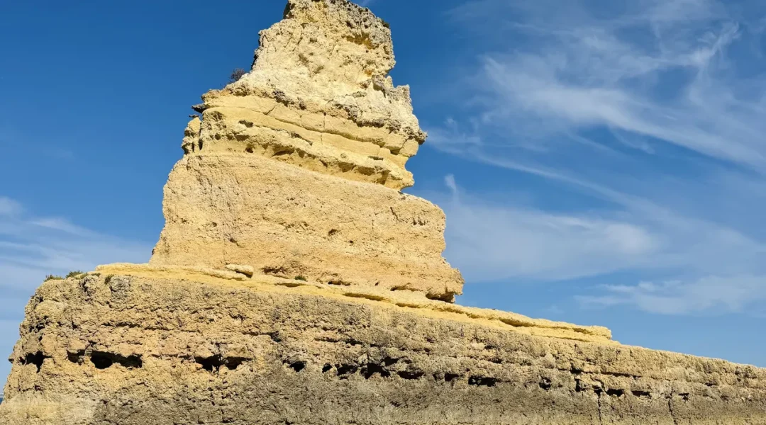 Coastal rock formation near the sea caves on the Algarve coast, seen during an Otter Tours boat tour