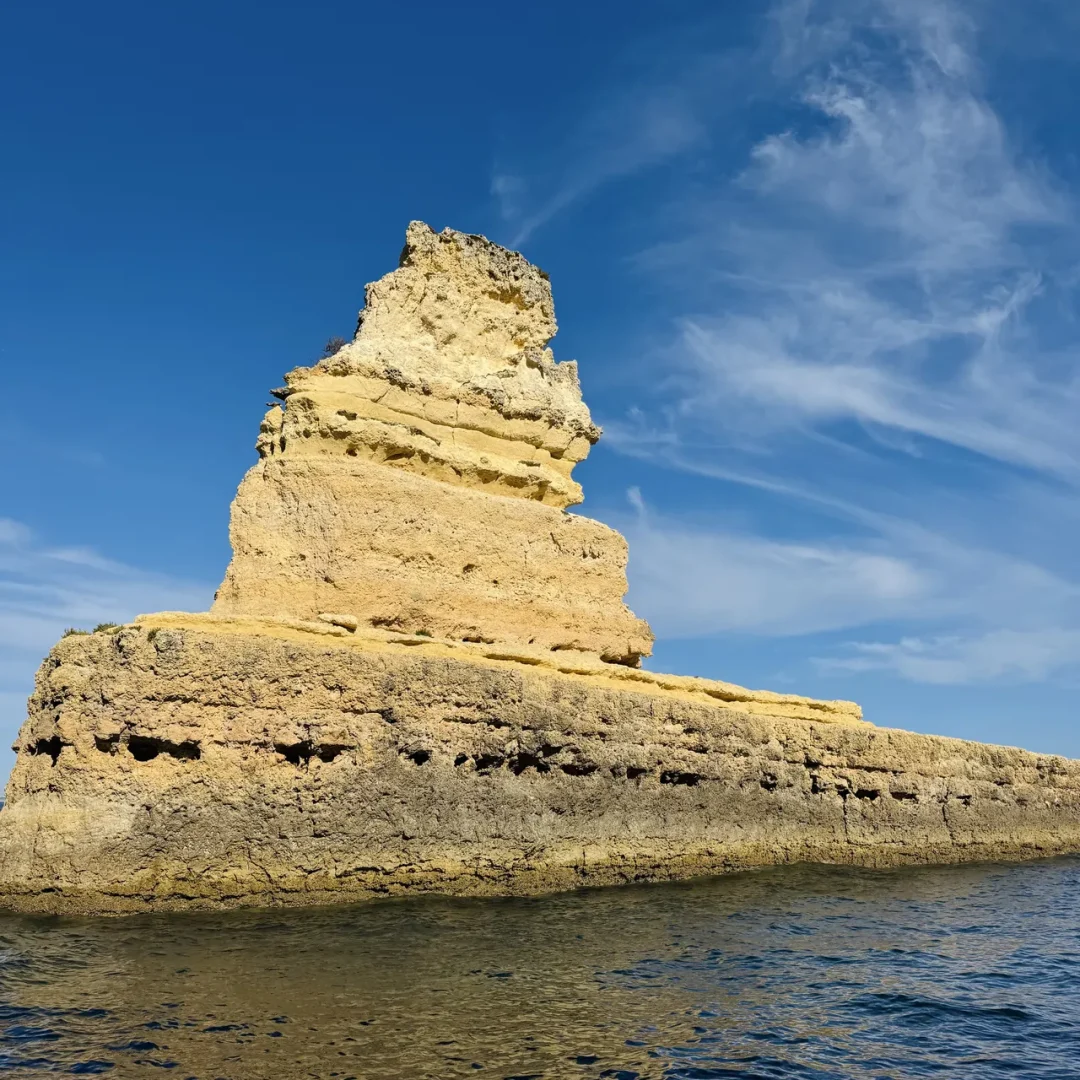 Coastal rock formation near the sea caves on the Algarve coast, seen during an Otter Tours boat tour